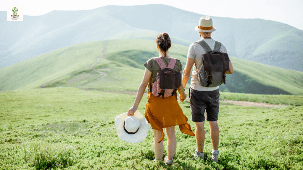 Couple practicing green travel while hiking through a mountain trail in an eco-friendly destination