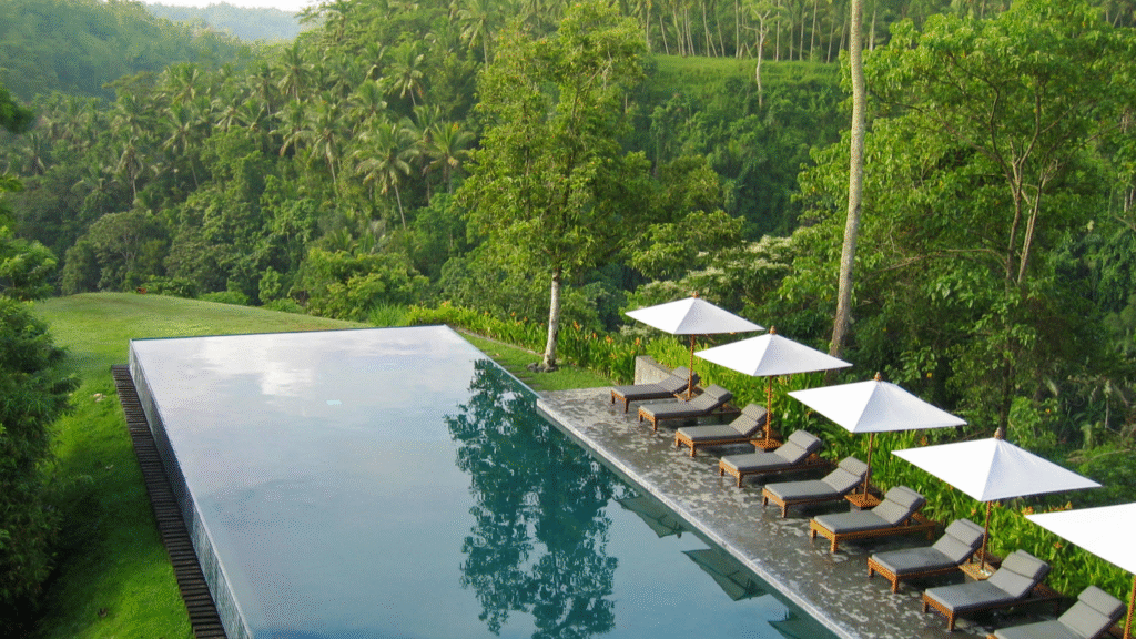 Eco-friendly pool at a sustainable resort surrounded by nature