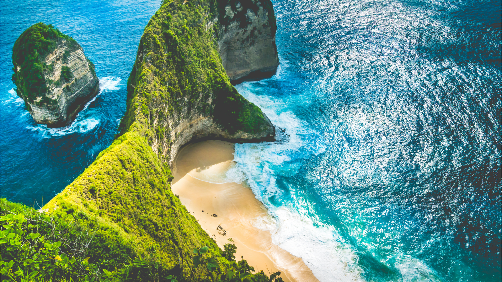 Bali beach with blue water and palms