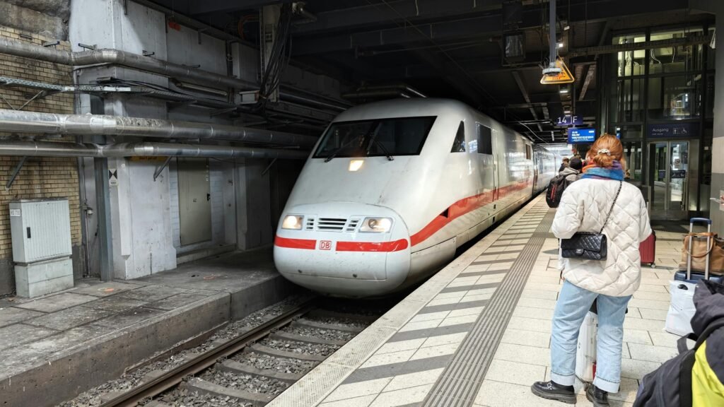 High-speed train arriving at a European station for a rail-first Europe travel itinerary