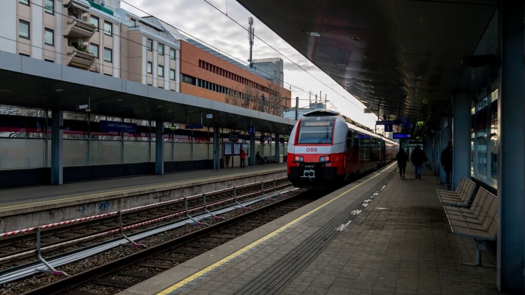 Modern train arriving at Vienna train station. Photo by Valentin Ivantsov via Pexels.
